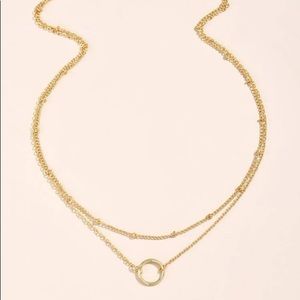 Gold colored necklace with circle tier 15 -17.5 length